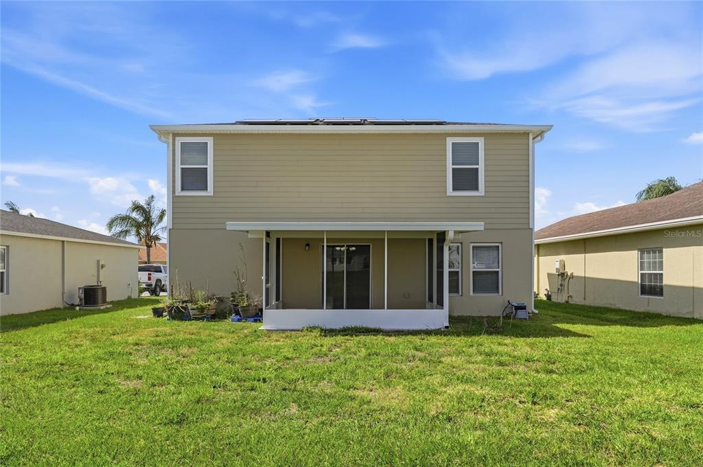 1637 Marble Street Sebring, FL 33870 - Photo 8 of 57 a view of a house with backyard