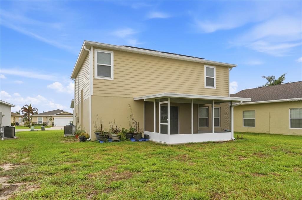 1637 Marble Street Sebring, FL 33870 - Photo 9 of 57 a view of a house with backyard