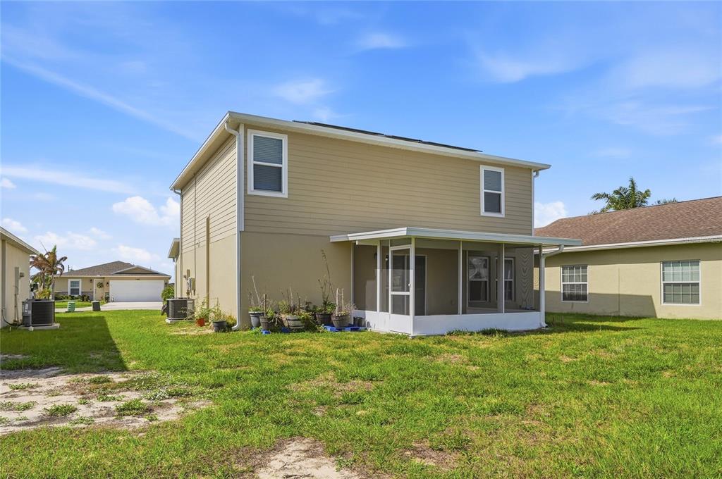 1637 Marble Street Sebring, FL 33870 - Photo 10 of 57 a view of a house with backyard
