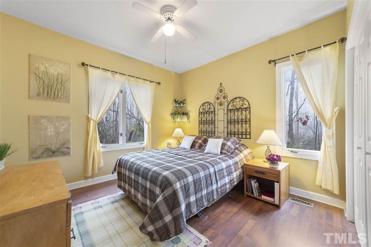 304 Shetland Road Rougemont, NC 27572 - Photo 14 of 29 a bedroom with a bed and a window