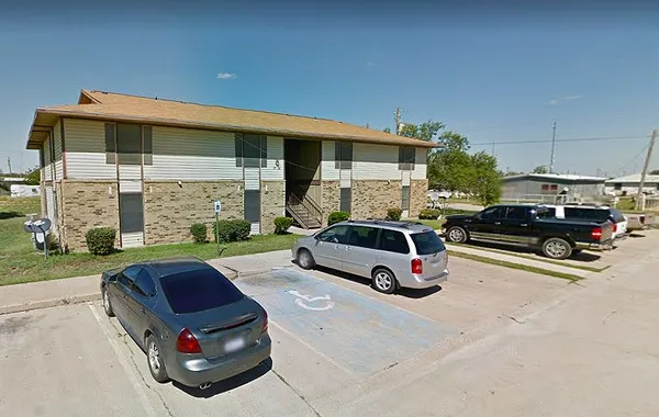 a car parked in front of a house