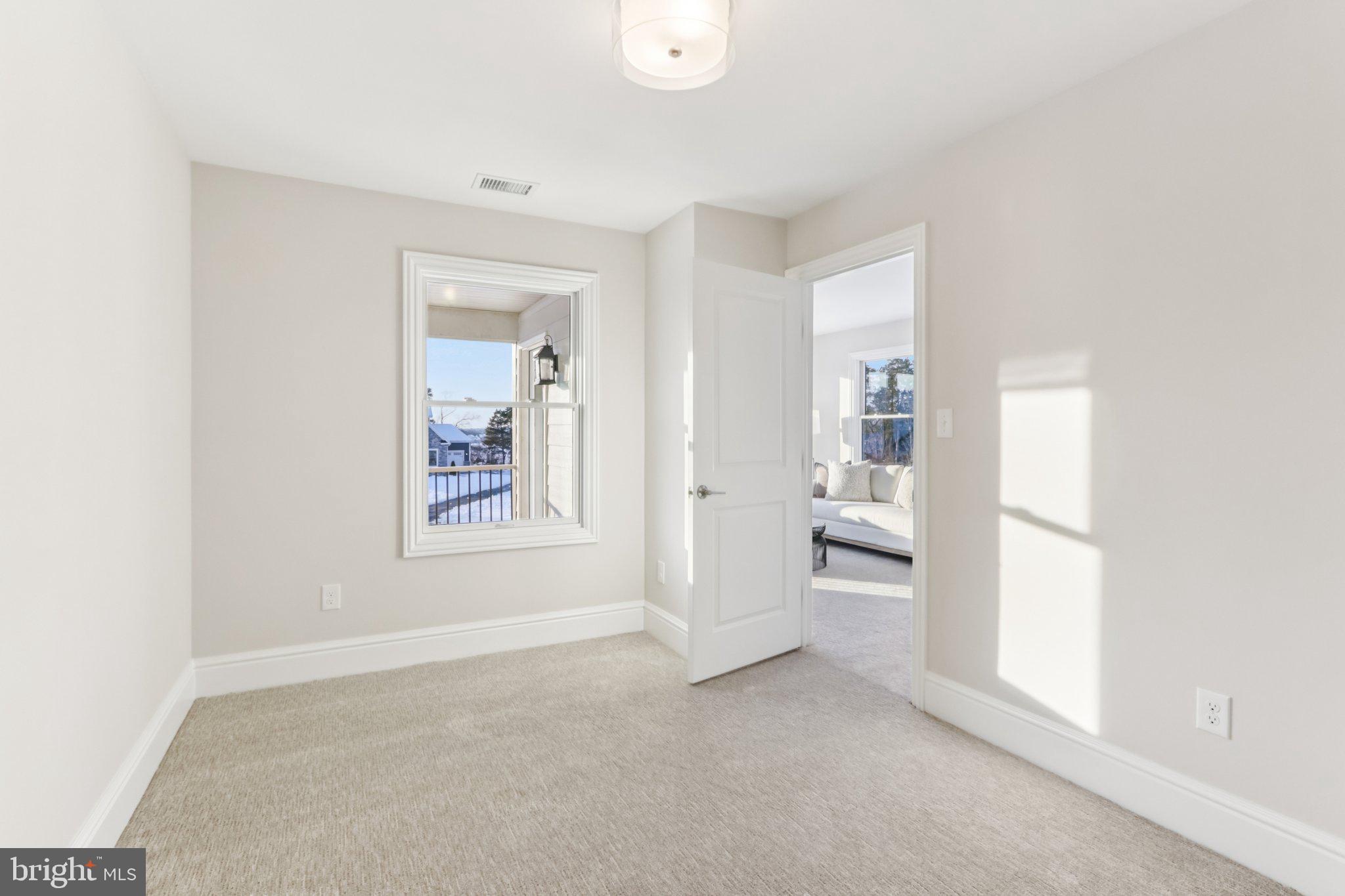510 Newcomen Road, Unit B3D Exton, PA 19341 - Photo 53 of 74 an empty room with windows and entrance