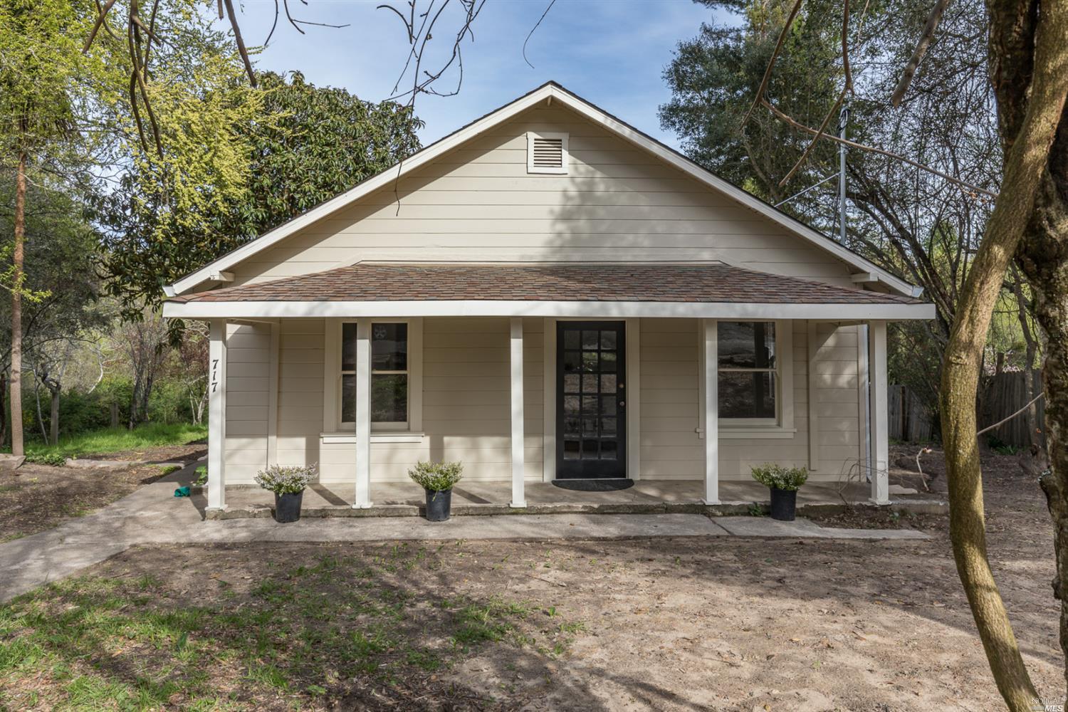 717 Robinson Road Sebastopol, CA 95472 - Photo 1 of 1 a front view of a house with yard