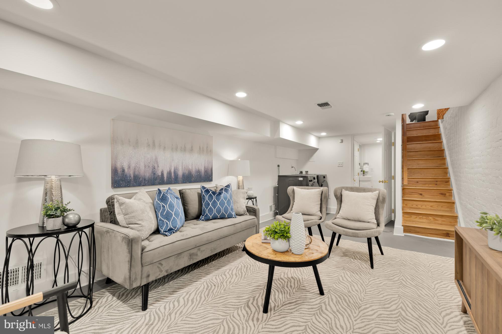 706 L Street Southeast Washington, DC 20003 - Photo 23 of 36 a living room with furniture and a wooden floor