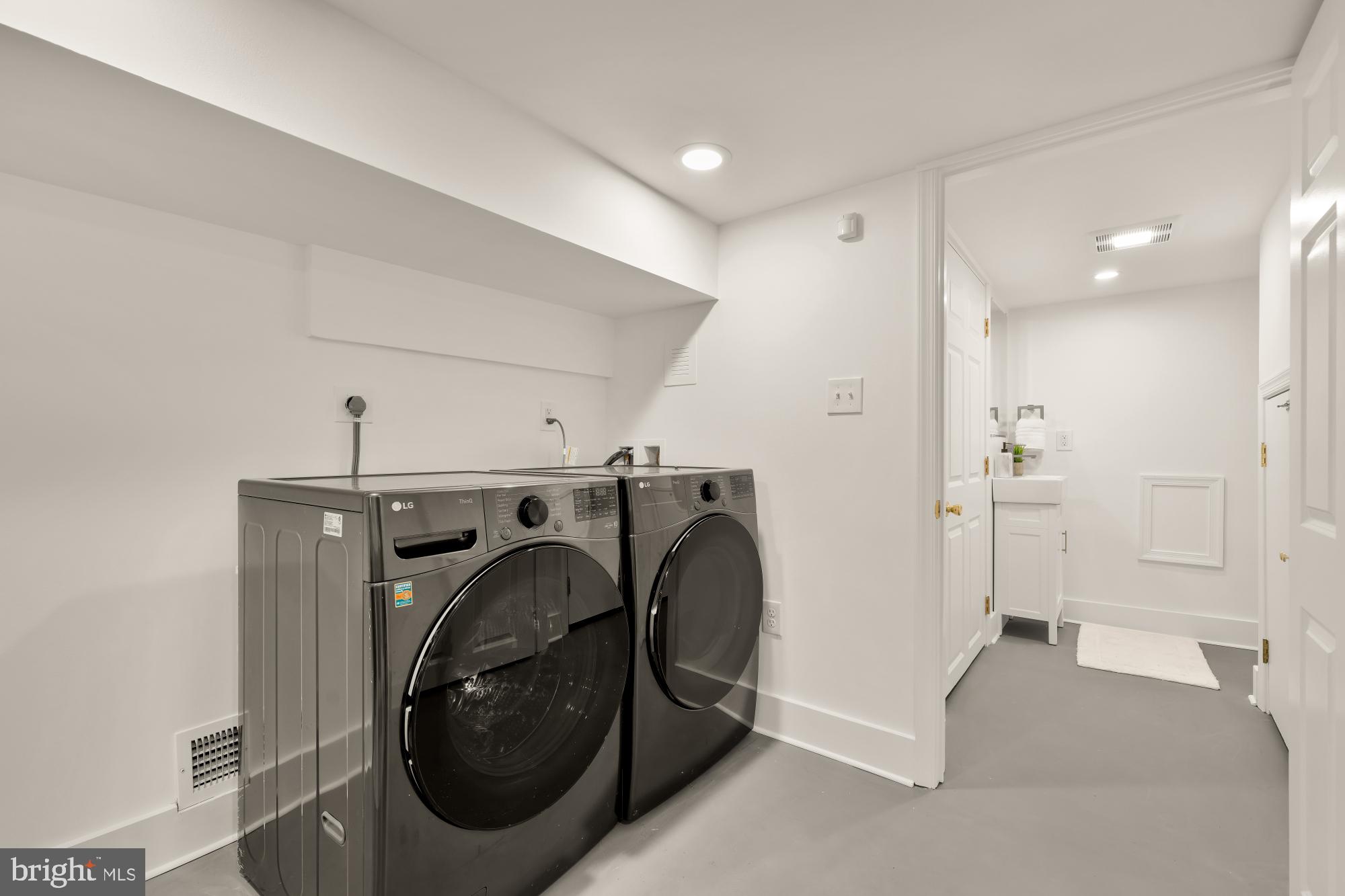 706 L Street Southeast Washington, DC 20003 - Photo 24 of 36 a utility room with dryer and washer