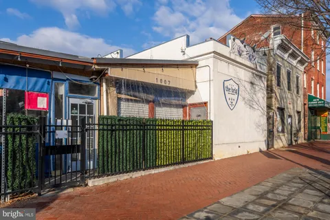 a view of a building with a street