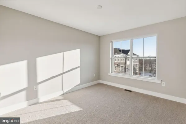 a view of livingroom with furniture and window