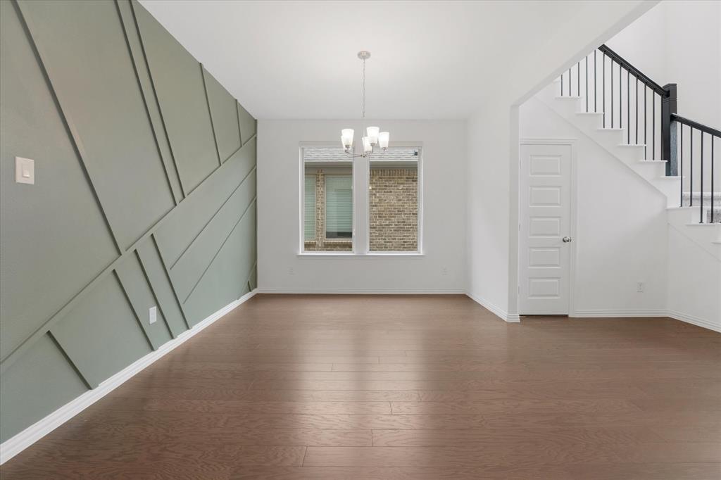 3533 Hyacinth Way Prosper, TX 75078 - Photo 6 of 38 an empty room with windows and entrance