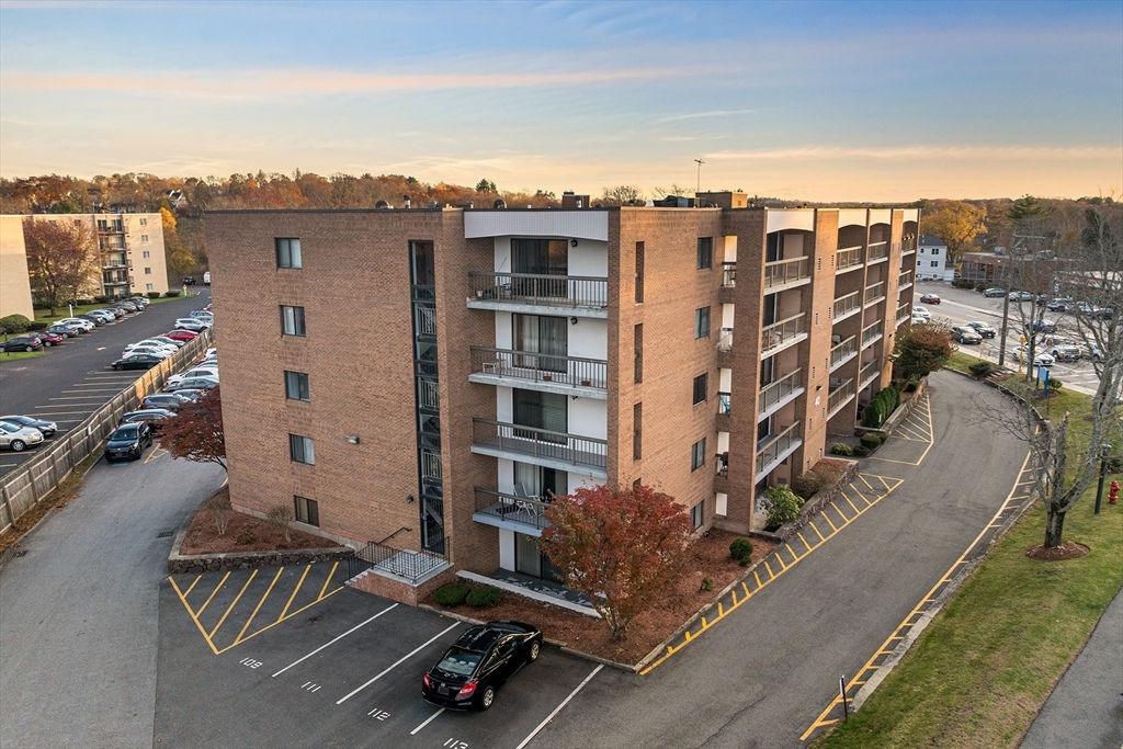 40 Main Street, Unit 505 Stoneham, MA 02180 - Photo 22 of 27 a view of a city with tall buildings