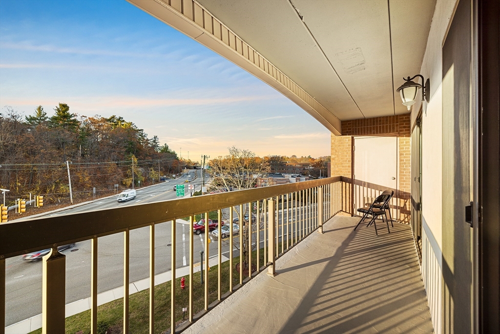 40 Main Street, Unit 505 Stoneham, MA 02180 - Photo 9 of 27 a view of city from a balcony
