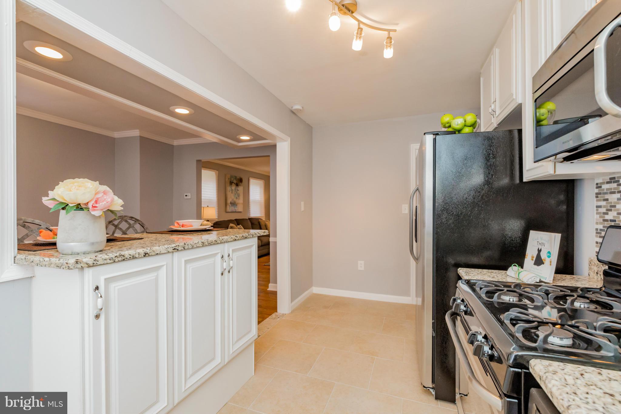 1229 Silverthorne Road Baltimore, MD 21239 - Photo 8 of 30 Kitchen