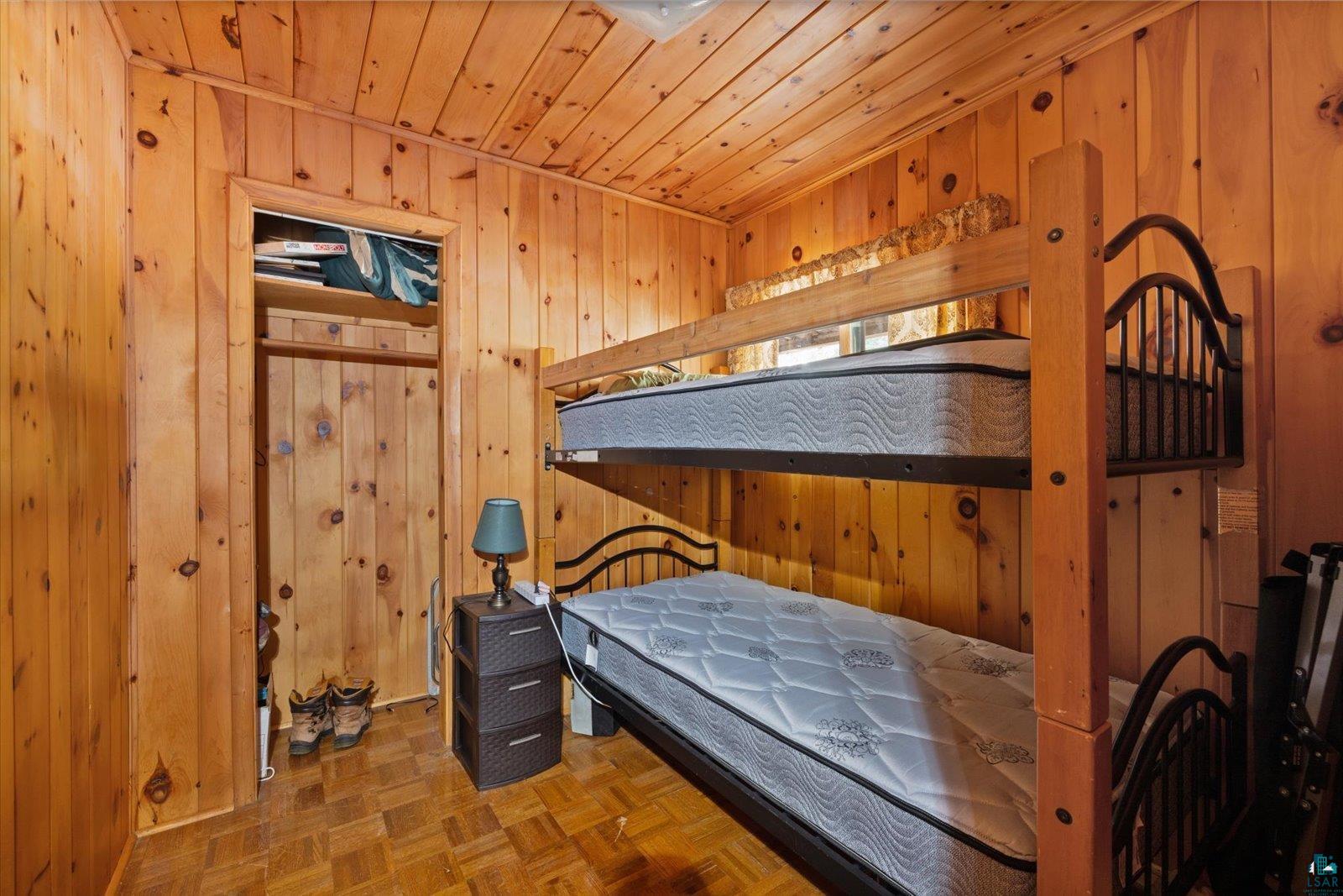 2014 West Frazer Bay Road Cook, MN 55723 - Photo 13 of 26 Knotty pine paneling throughout, including walls and ceiling