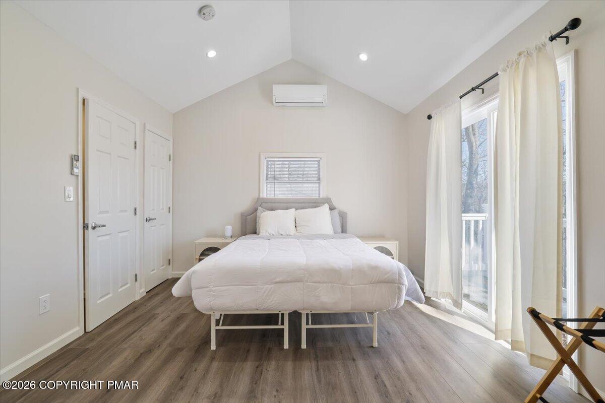 5873 Decker Road Bushkill, PA 18324 - Photo 10 of 57 a bedroom with a bed and a table