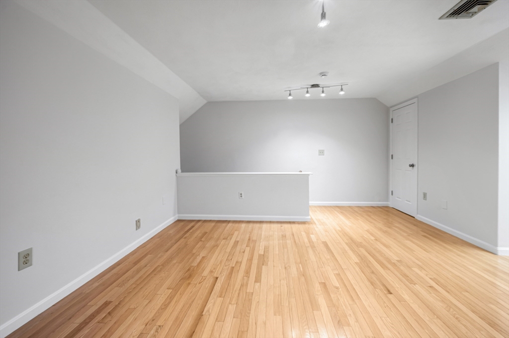 4 Deer Path, Unit 3 Maynard, MA 01754 - Photo 24 of 27 wooden floor in a room