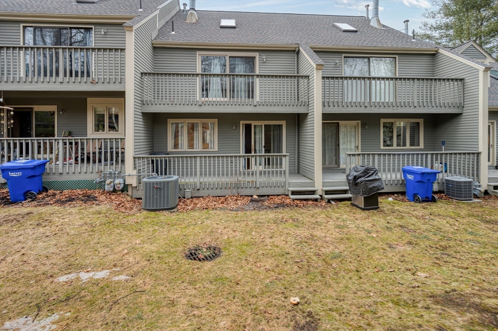 4 Deer Path, Unit 3 Maynard, MA 01754 - Photo 27 of 27 a view of a house with roof and sitting area
