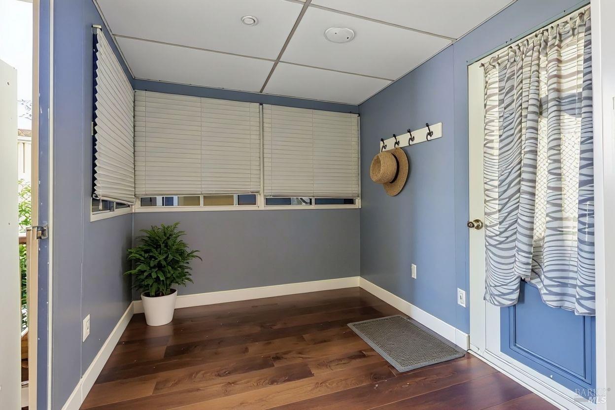 56 Club View Drive Novato, CA 94949 - Photo 12 of 27 a room with window and wooden floor
