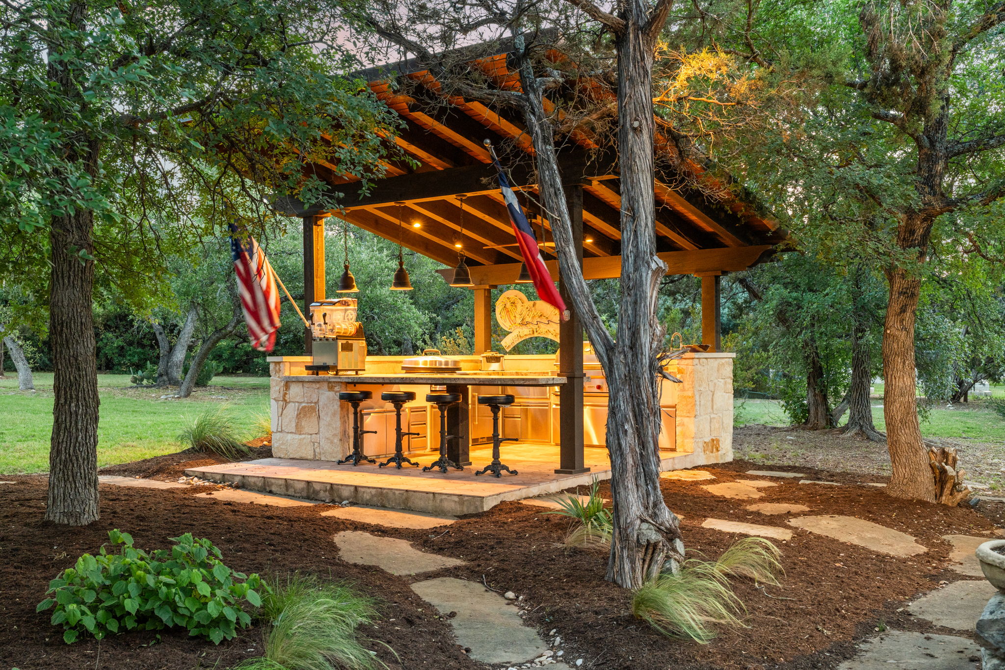 11941 Overlook Pass Austin, TX 78738 - Photo 19 of 38 a view of a house with backyard and a tree