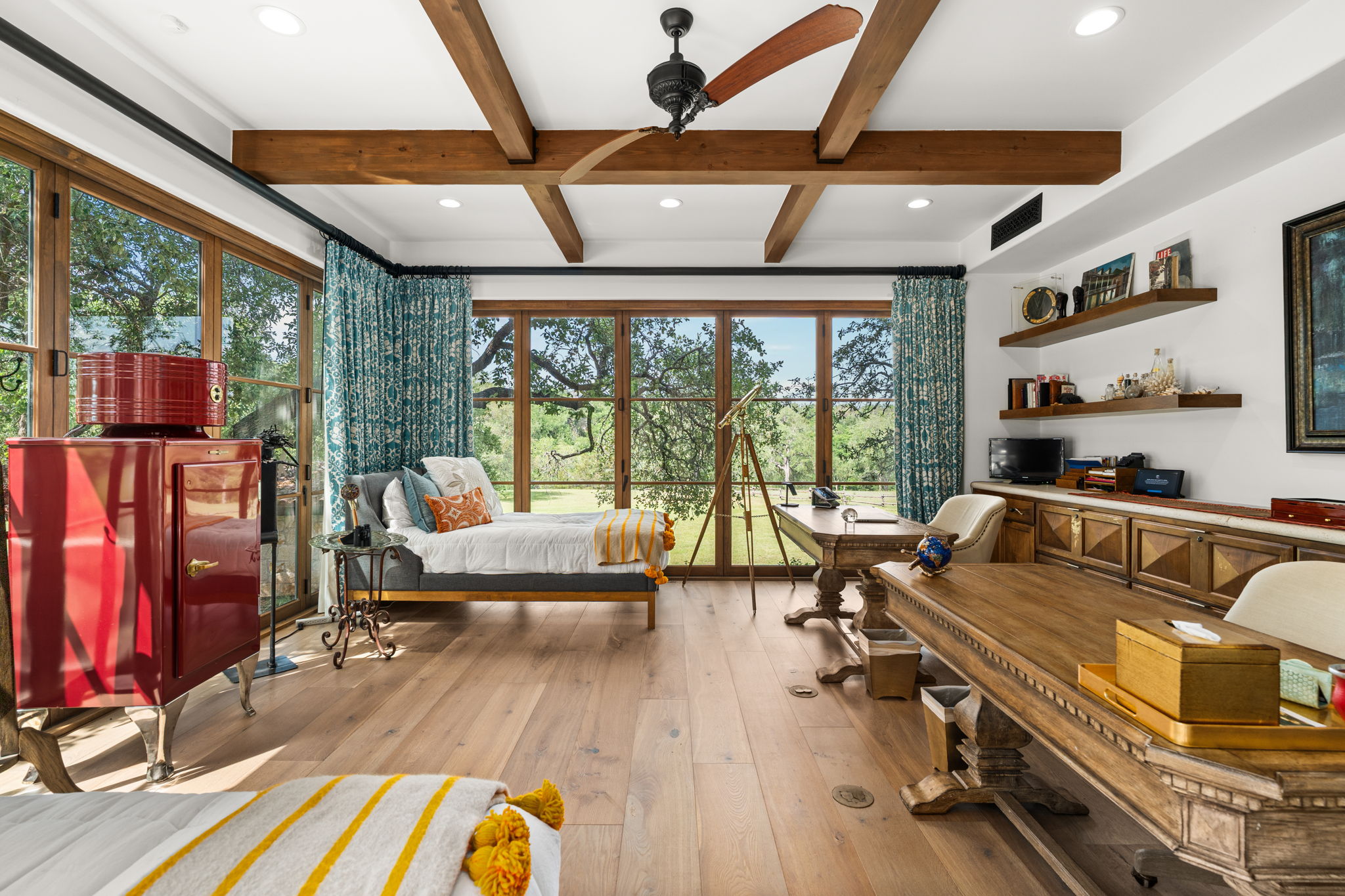 11941 Overlook Pass Austin, TX 78738 - Photo 30 of 38 a living room with furniture a fireplace and wooden floor
