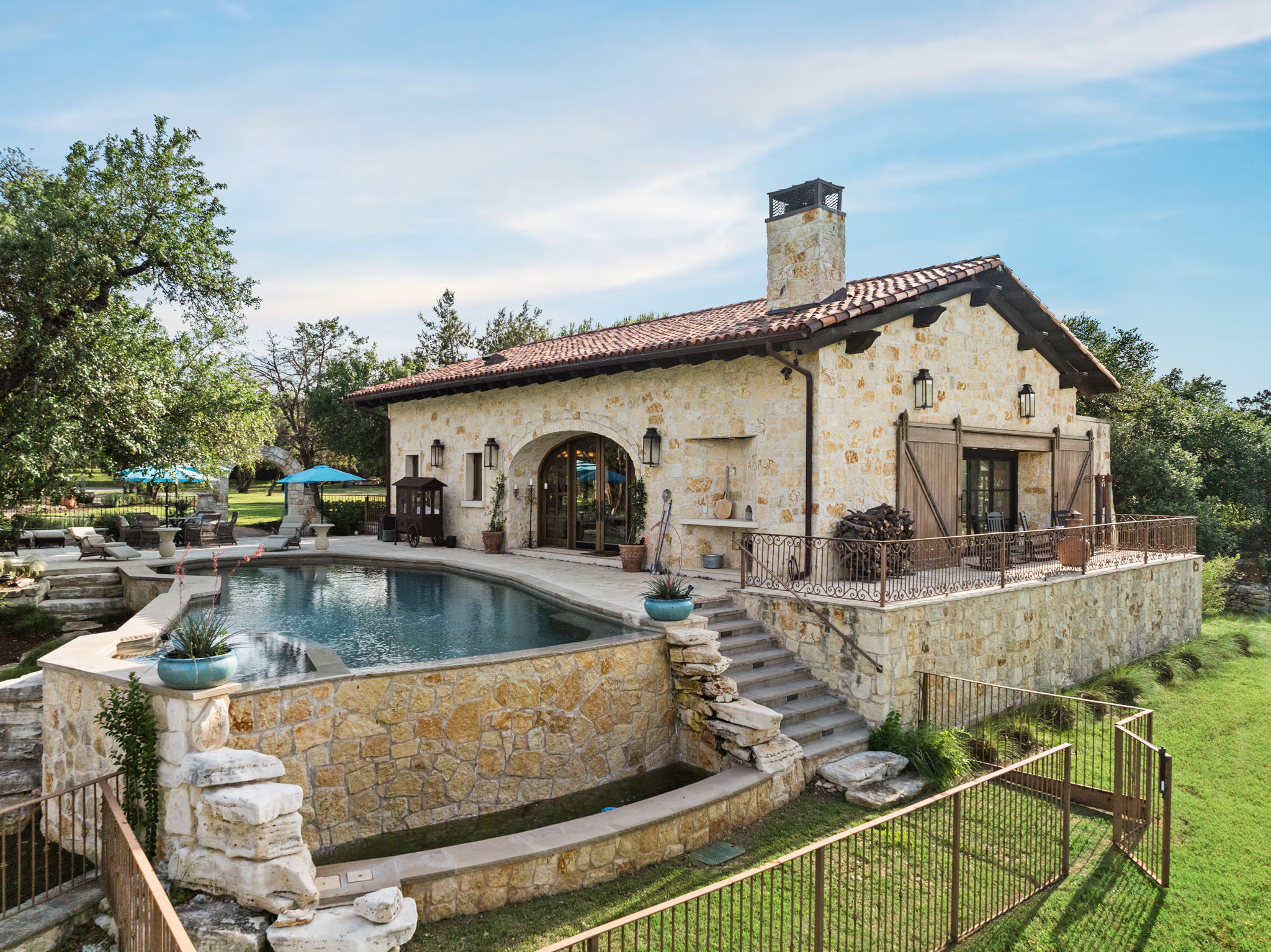 11941 Overlook Pass Austin, TX 78738 - Photo 38 of 38 a view of a house with pool table and chairs