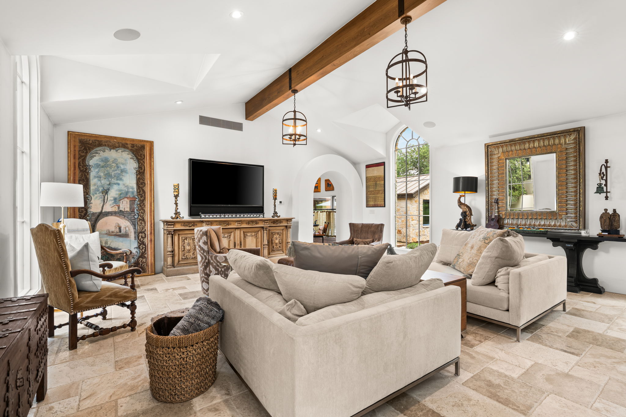 11941 Overlook Pass Austin, TX 78738 - Photo 6 of 38 a living room with furniture a flat screen tv and a floor to ceiling window