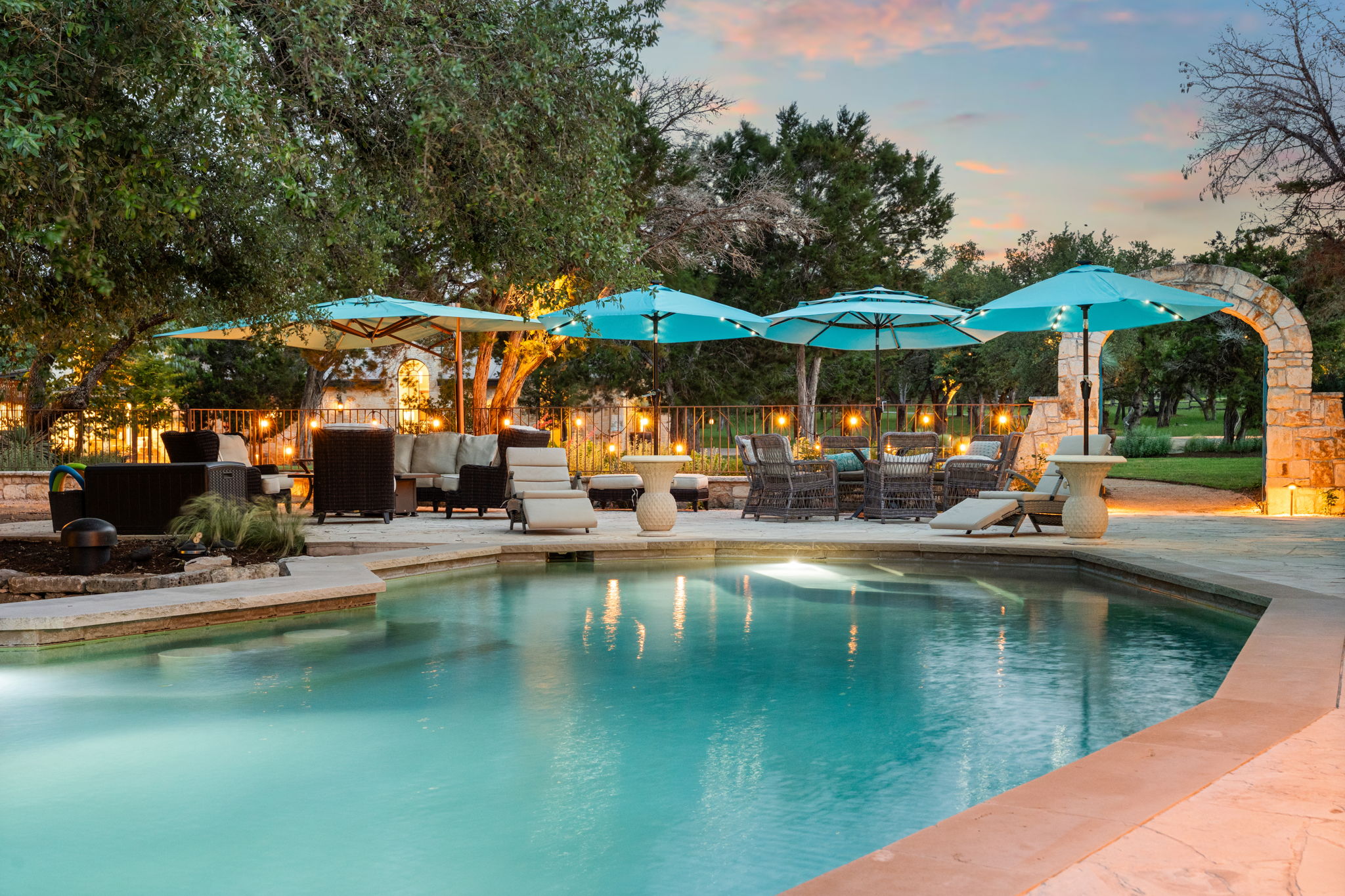 11941 Overlook Pass Austin, TX 78738 - Photo 8 of 38 a view of swimming pool with outdoor seating and lake view