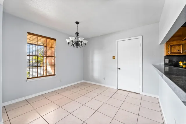 a view of a kitchen with a sink and dishwasher in kitchen