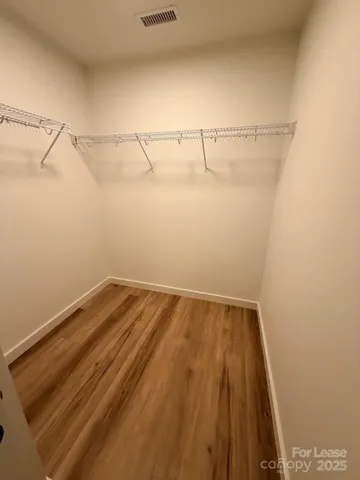 a view of a room with racks on the wall