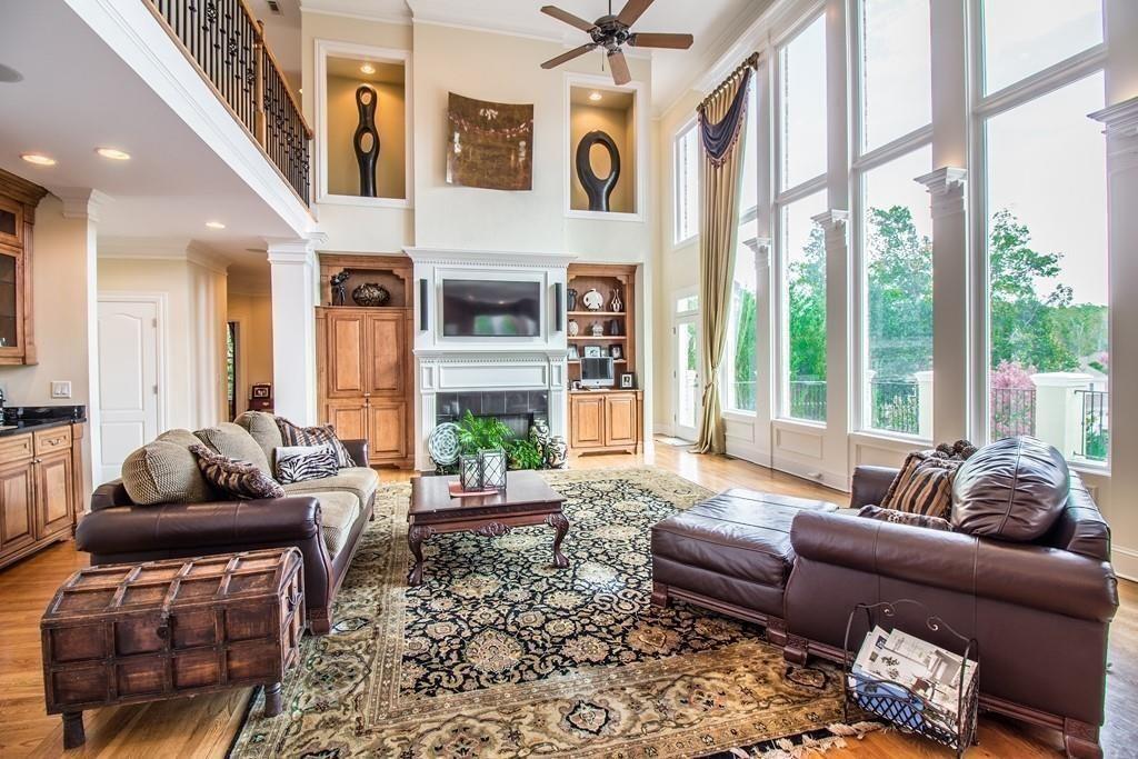4064 Lyon Boulevard Southwest Atlanta, GA 30331 - Photo 11 of 38 a living room with furniture and floor to ceiling windows
