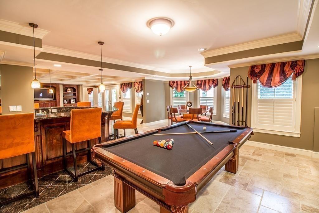 4064 Lyon Boulevard Southwest Atlanta, GA 30331 - Photo 27 of 38 a room with table tennis air hockey table and arcade game machine