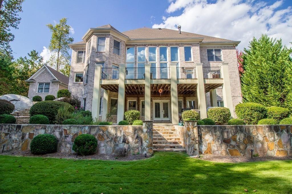 4064 Lyon Boulevard Southwest Atlanta, GA 30331 - Photo 32 of 38 a front view of a house with a yard