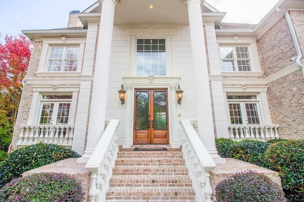 4064 Lyon Boulevard Southwest Atlanta, GA 30331 - Photo 34 of 38 front view of a house with a yard