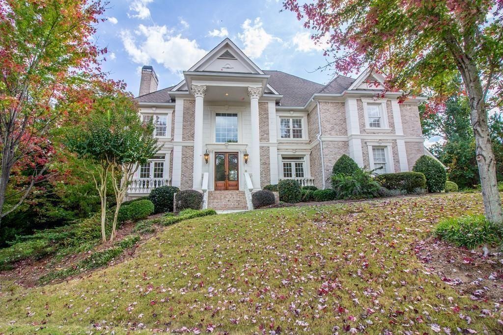 4064 Lyon Boulevard Southwest Atlanta, GA 30331 - Photo 38 of 38 a front view of a house with a yard