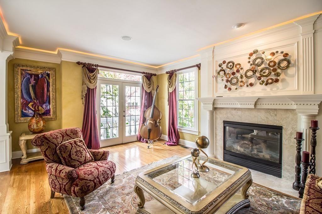 4064 Lyon Boulevard Southwest Atlanta, GA 30331 - Photo 10 of 38 a living room with furniture a window and a fireplace