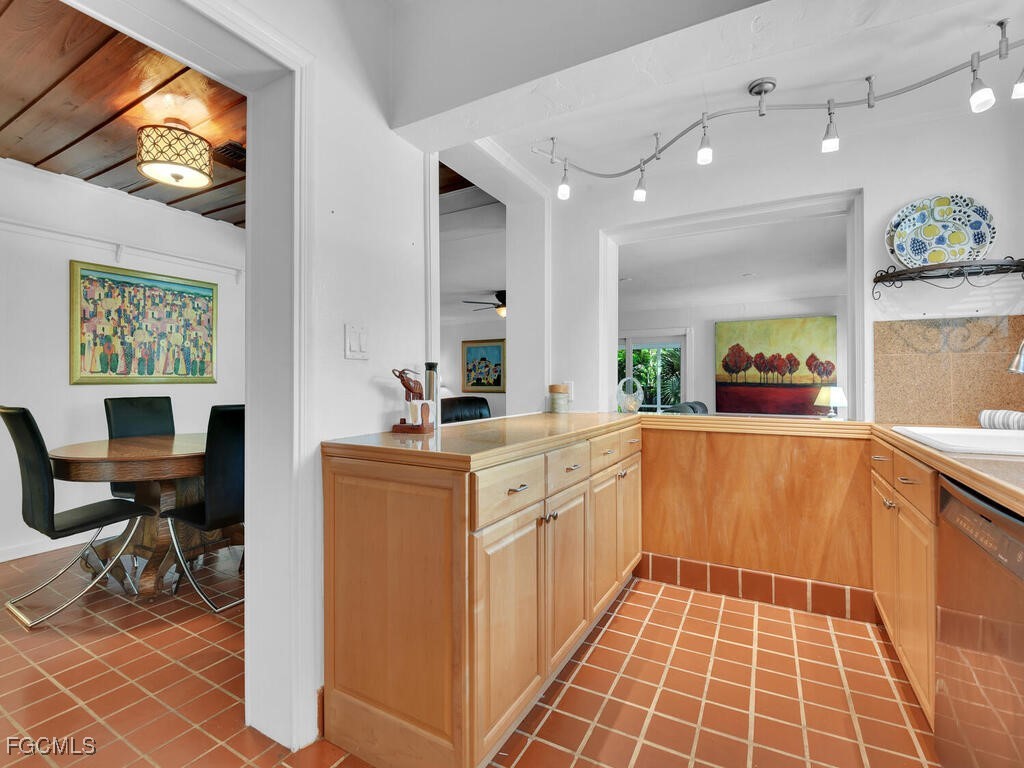 1803 Ardmore Road Fort Myers, FL 33901 - Photo 11 of 39 a large kitchen with a window