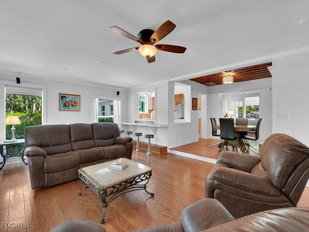 1803 Ardmore Road Fort Myers, FL 33901 - Photo 17 of 39 a living room with furniture kitchen view and a window