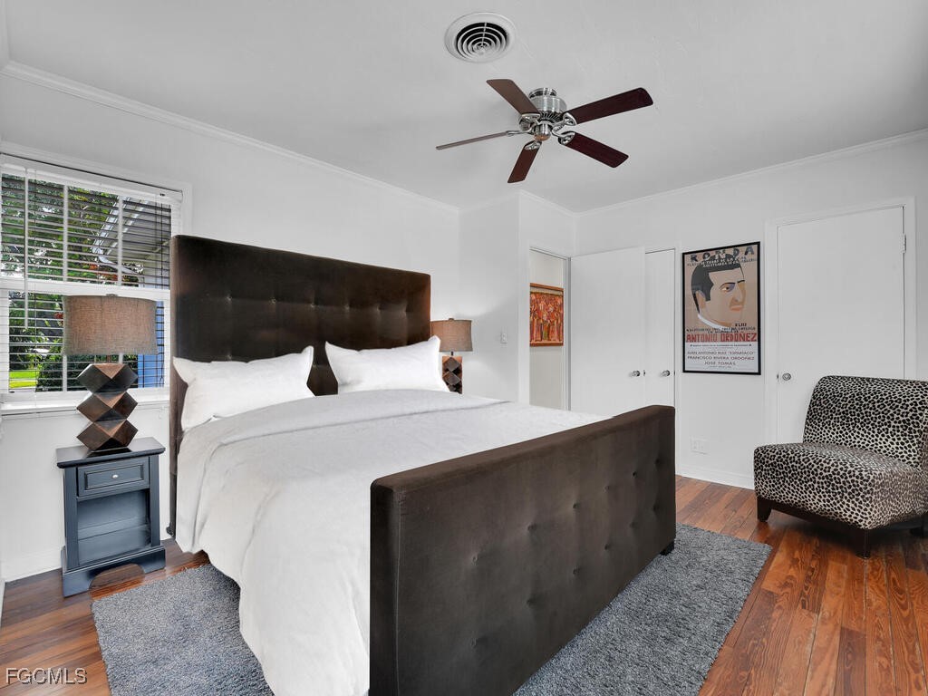 1803 Ardmore Road Fort Myers, FL 33901 - Photo 21 of 39 a bedroom with a large bed and a couch