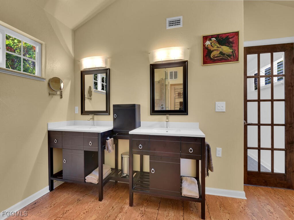 1803 Ardmore Road Fort Myers, FL 33901 - Photo 23 of 39 a room with a table chairs and windows