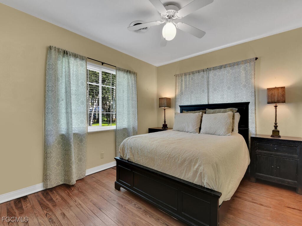 1803 Ardmore Road Fort Myers, FL 33901 - Photo 25 of 39 a bedroom with a bed and window