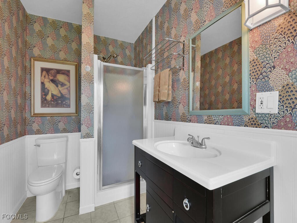 1803 Ardmore Road Fort Myers, FL 33901 - Photo 32 of 39 a bathroom with a sink toilet and shower