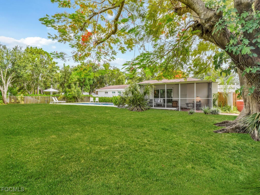 1803 Ardmore Road Fort Myers, FL 33901 - Photo 38 of 39 a front view of house with a garden