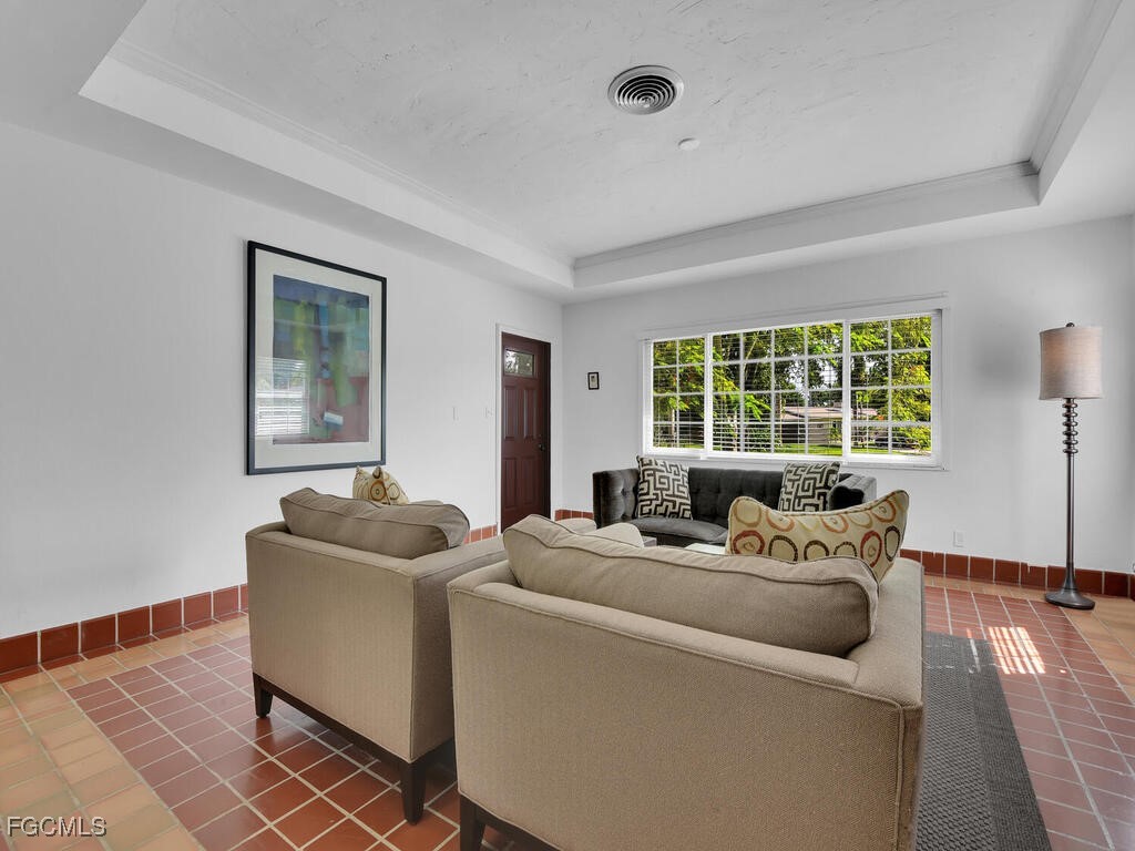 1803 Ardmore Road Fort Myers, FL 33901 - Photo 5 of 39 a living room with furniture and a window