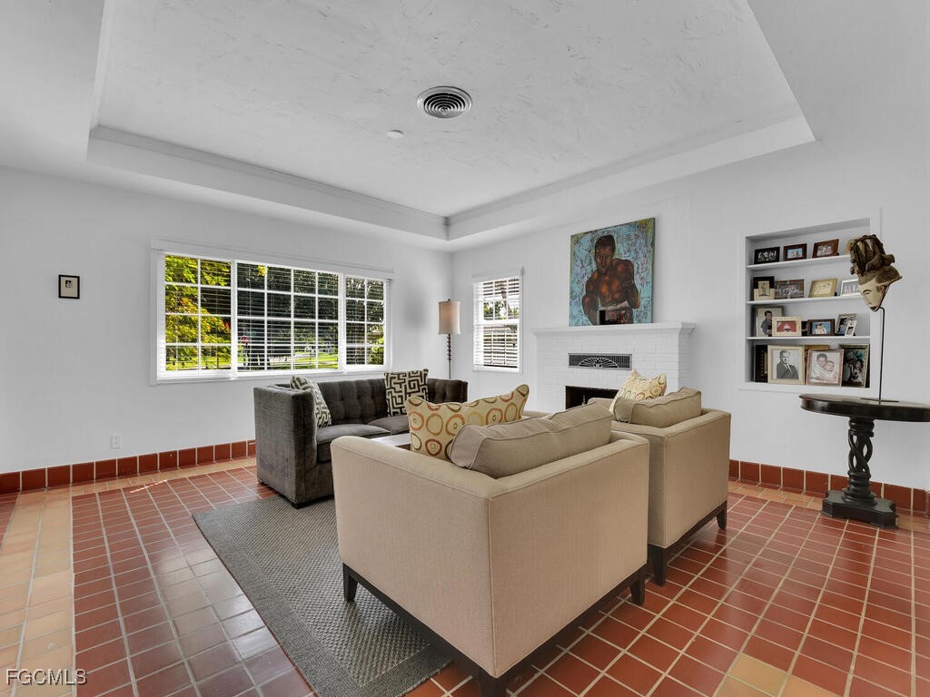 1803 Ardmore Road Fort Myers, FL 33901 - Photo 7 of 39 a living room with furniture and a window