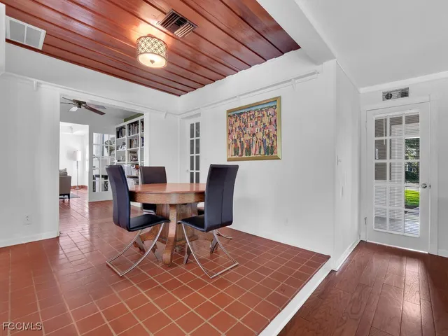 a workspace with furniture and wooden floor