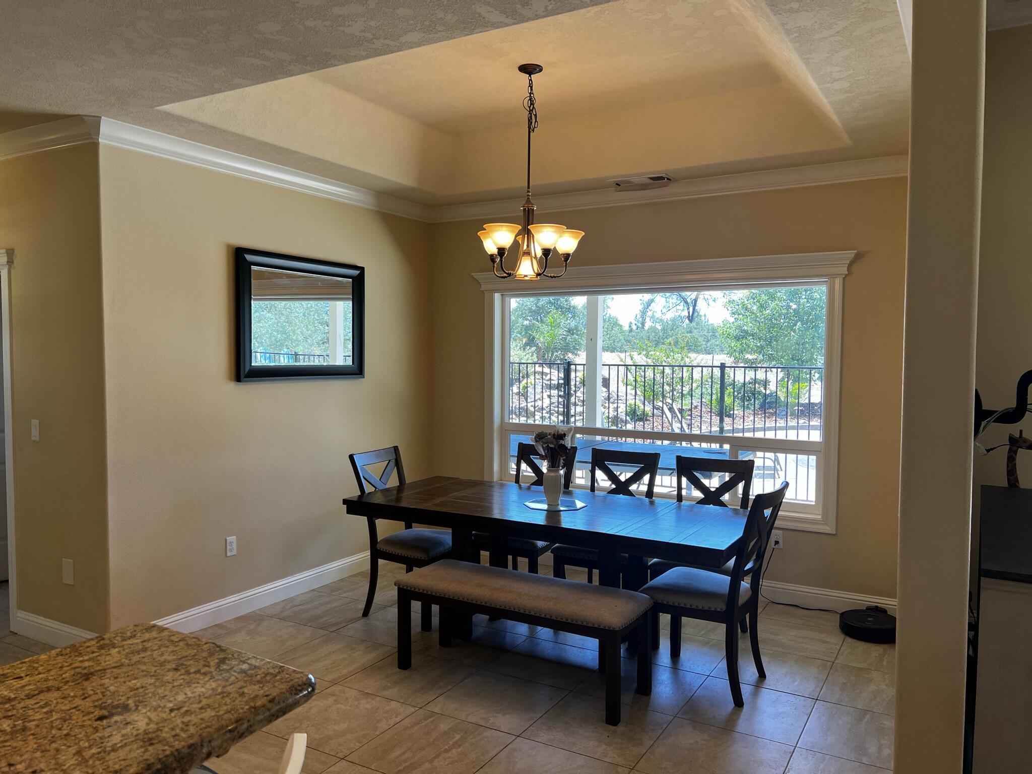 20901 Old 44 Drive Redding, CA 96003 - Photo 36 of 59 a dining room with furniture and window