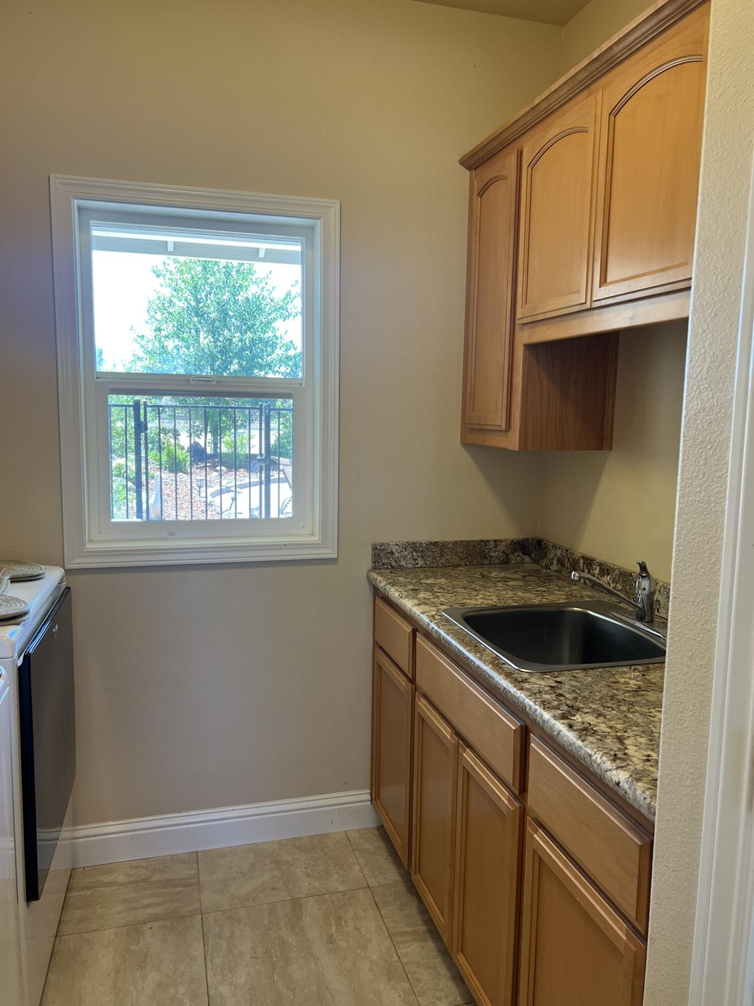 20901 Old 44 Drive Redding, CA 96003 - Photo 39 of 59 a kitchen that has a sink and a stove