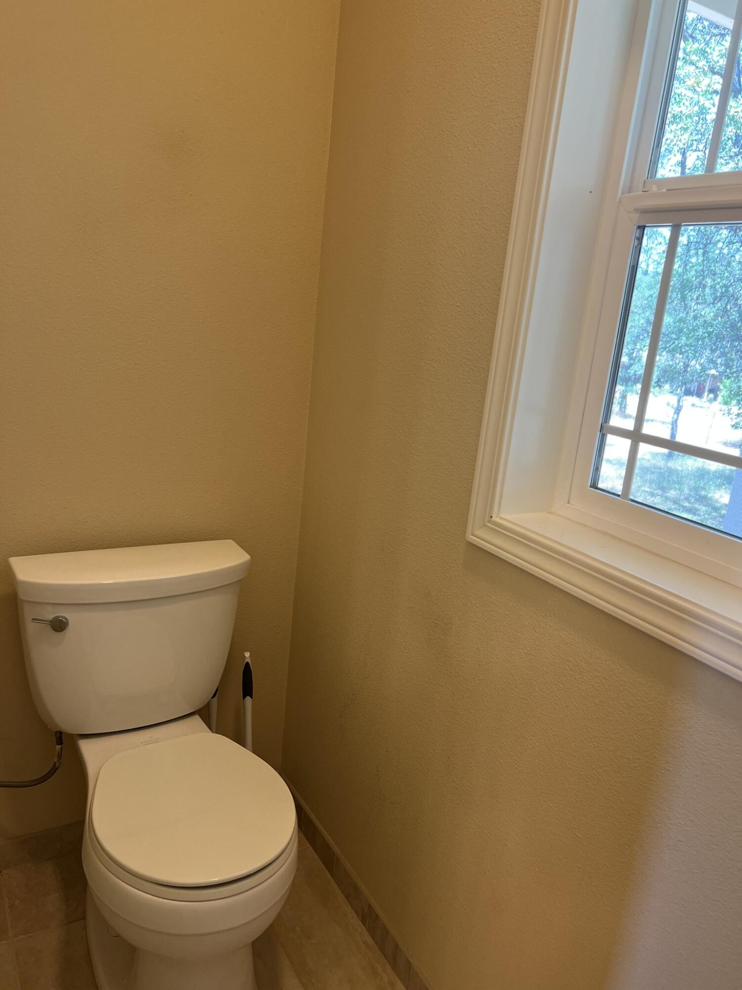20901 Old 44 Drive Redding, CA 96003 - Photo 44 of 59 a white toilet sitting next to a window