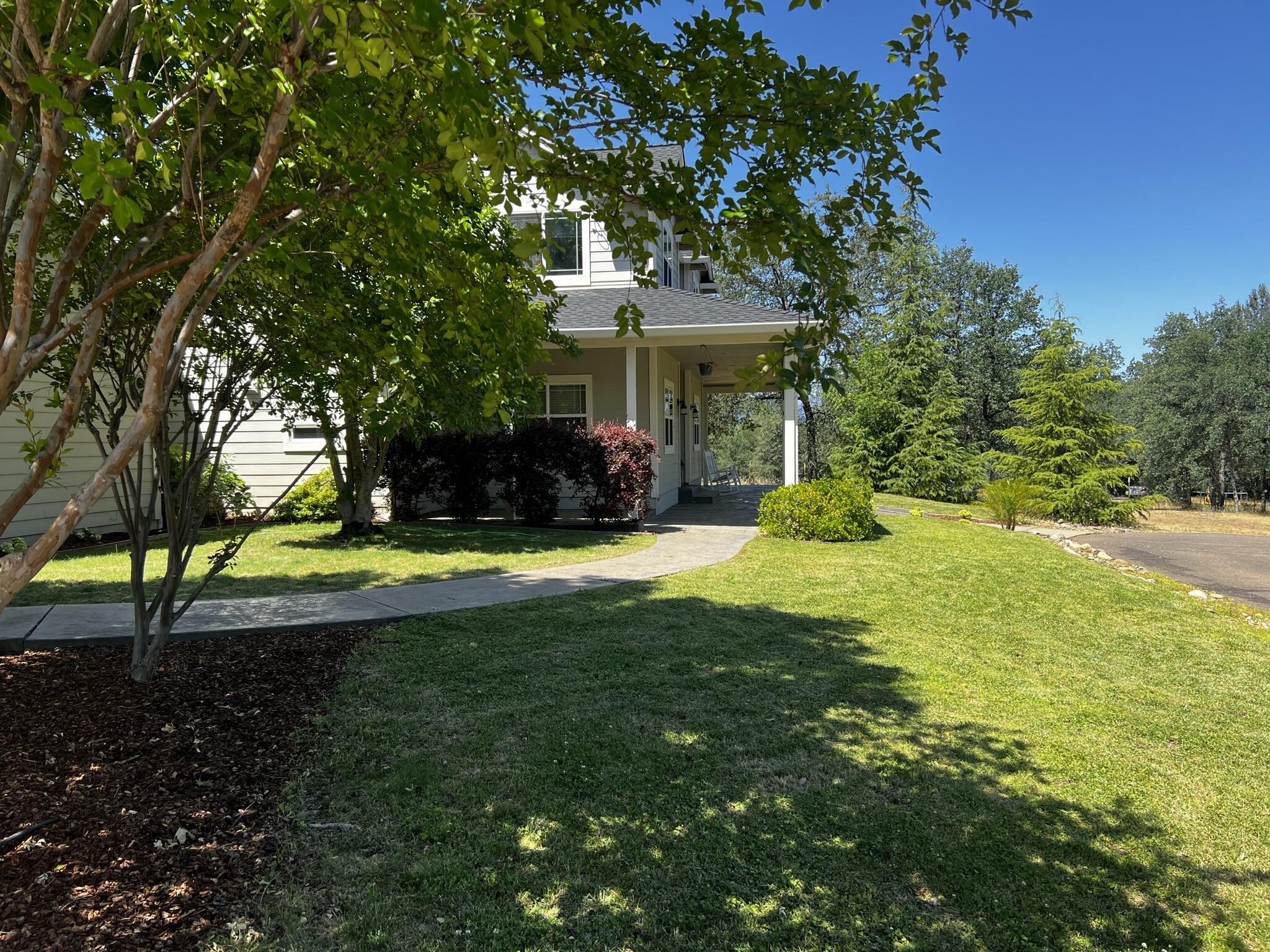 20901 Old 44 Drive Redding, CA 96003 - Photo 5 of 59 a view of a house with a yard