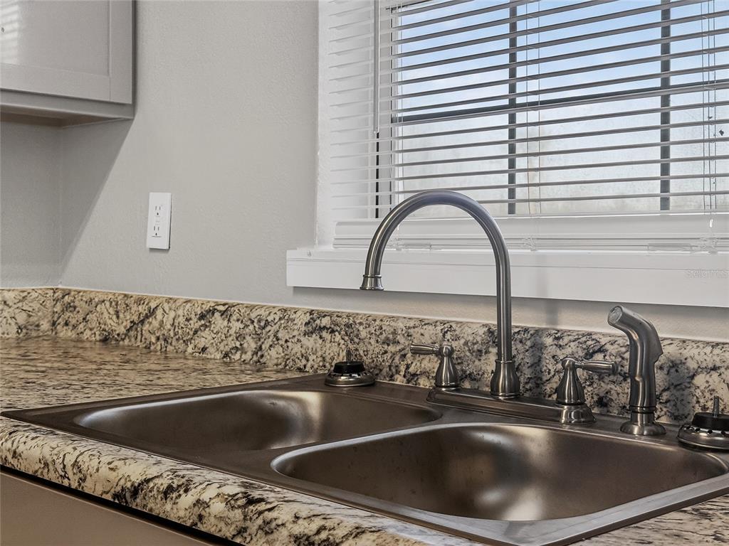 510 North Barrow Avenue Tavares, FL 32778 - Photo 12 of 33 a close view of sink and tap