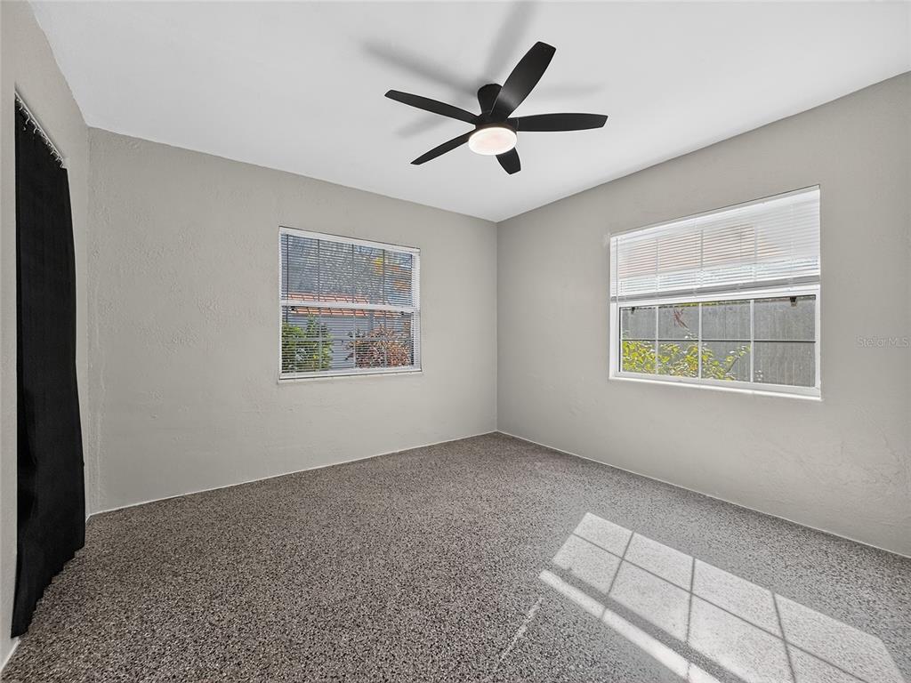 510 North Barrow Avenue Tavares, FL 32778 - Photo 14 of 33 a view of an empty room with a window