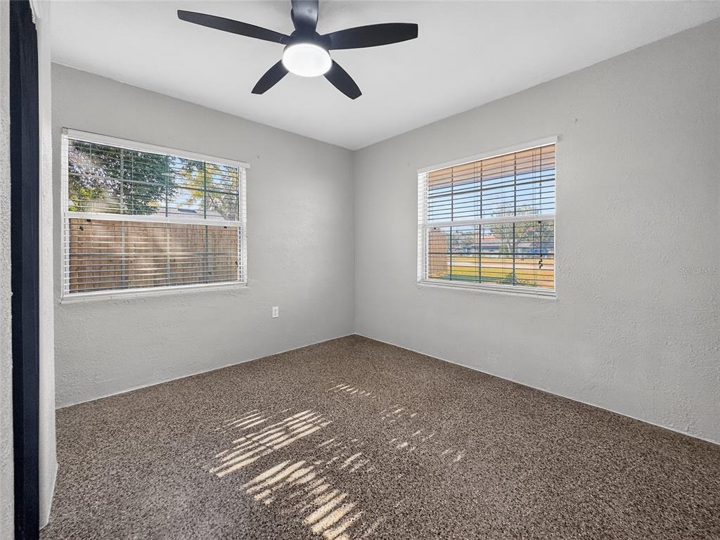510 North Barrow Avenue Tavares, FL 32778 - Photo 18 of 33 a view of an empty room with a window